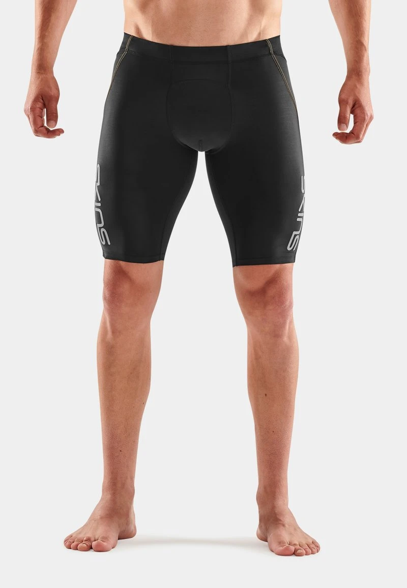 SKINS Kurze Sporthose - Black Yellow 1 SKINS Kurze Sporthose - Black Yellow