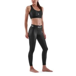 SKINS 1-Series 7/8 Long Tights Damen - Schwarz -Skins skins compression women 1 series 7 8 long tights black 4 893085